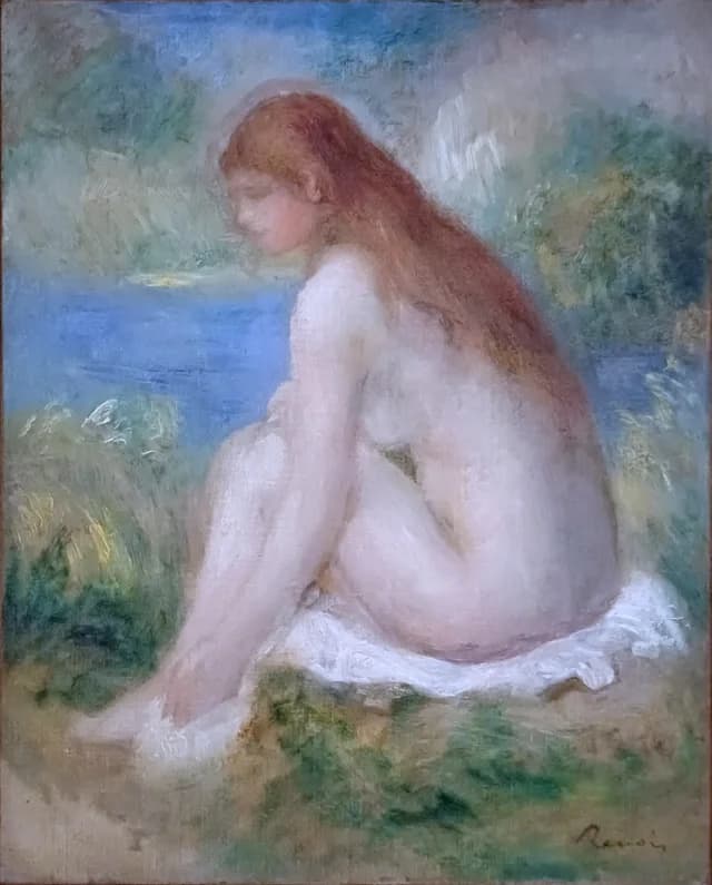 Donna nuda seduta