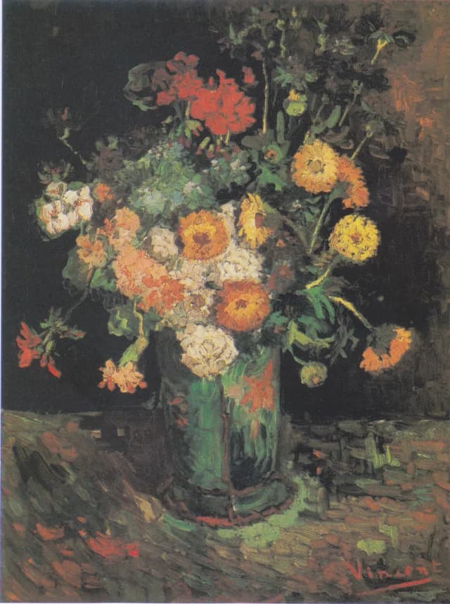 Vaso con zinnie e gerani