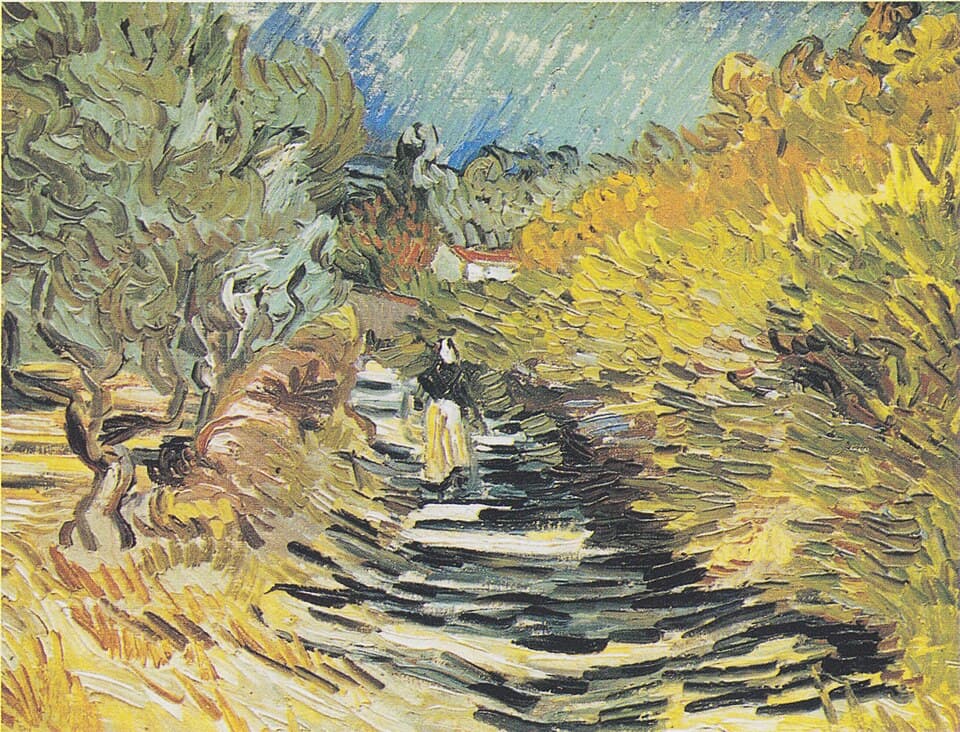 Eine Straße in Saint-Rémy mit weiblicher Figur