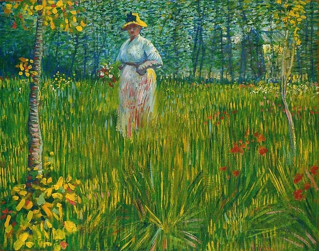 A Woman Walking in a Garden