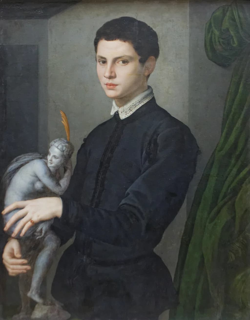 Portrait of a Man Holding a Statuette