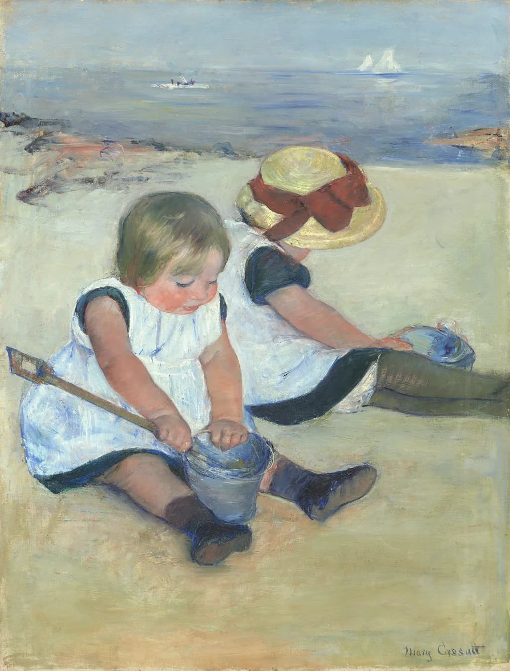 Kinder spielen am Strand