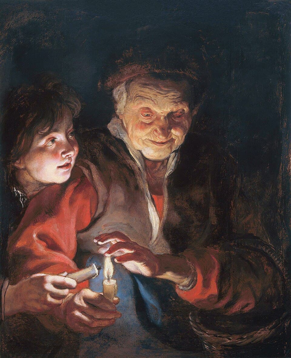 Old woman and boy with candles
