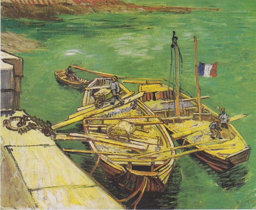 Quay with men unloading sand barges