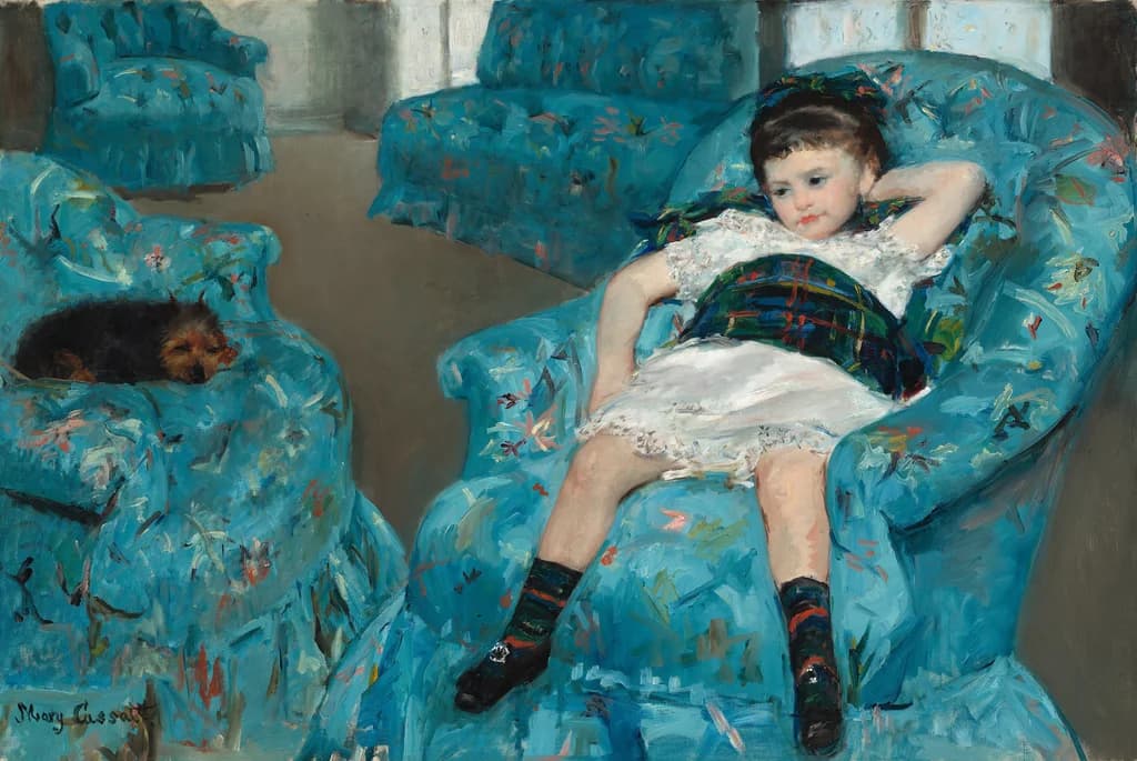 Kleines Mädchen im blauen Sessel
