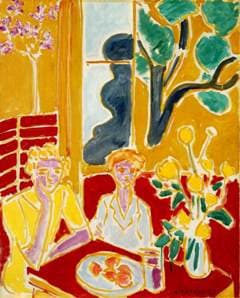Two Young Girls in a Red and Yellow Interior