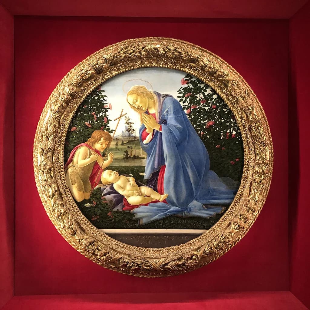 Madonna adoring the Child with St. John the Baptist