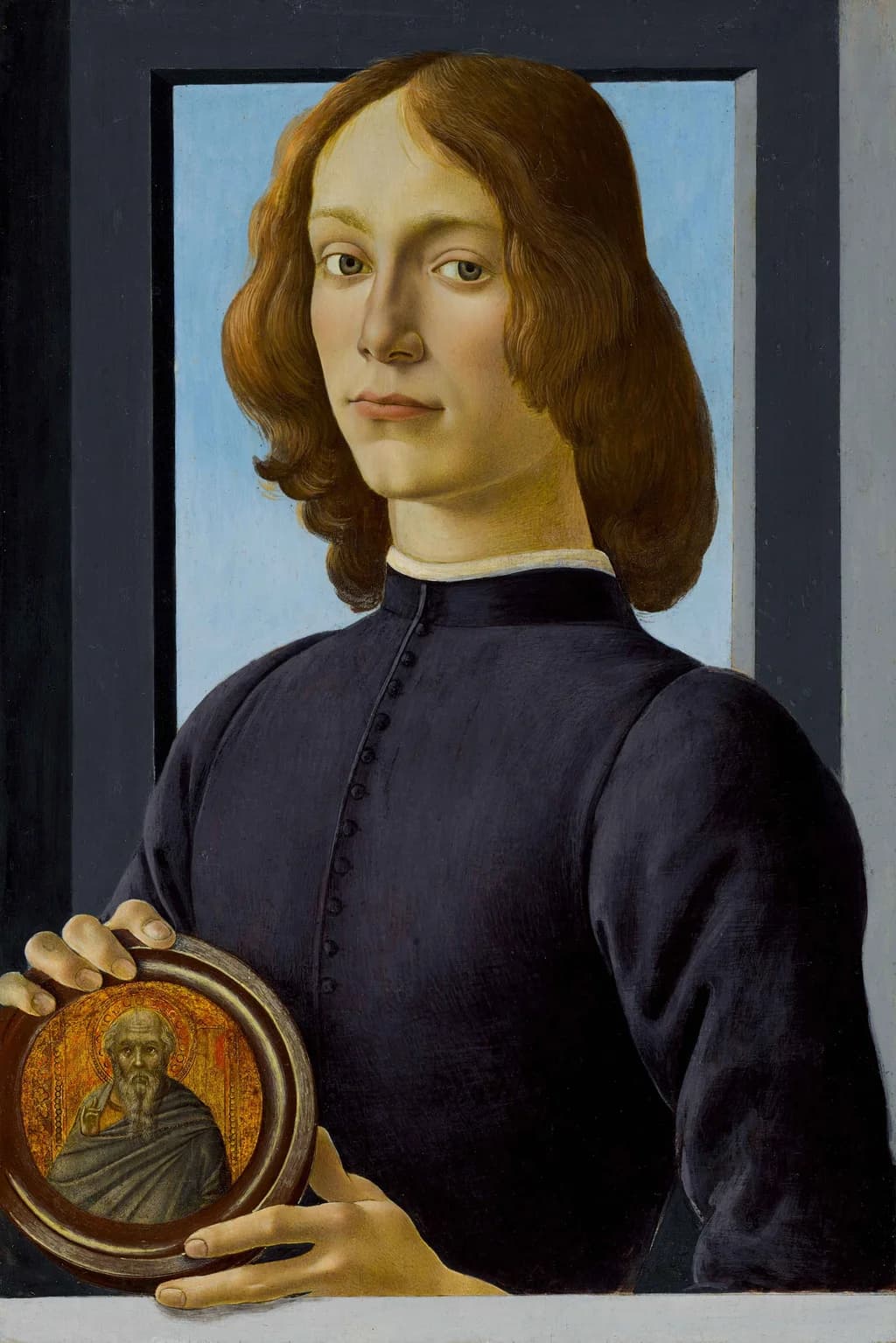 Young Man Holding a Roundel